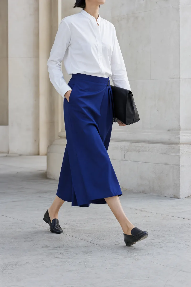 Cobalt culottes in a stone colonnade