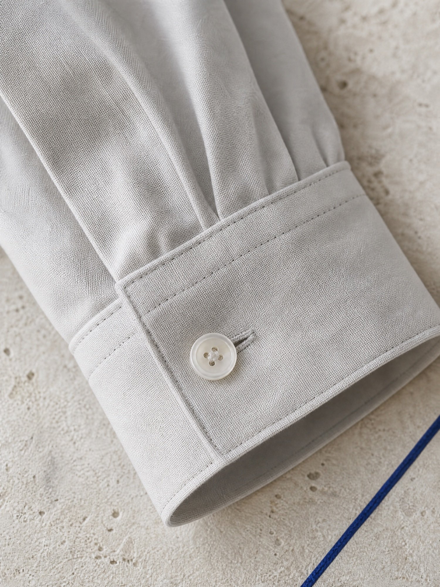 The Relaxed Poplin Shirt in Ivory, close-up detail