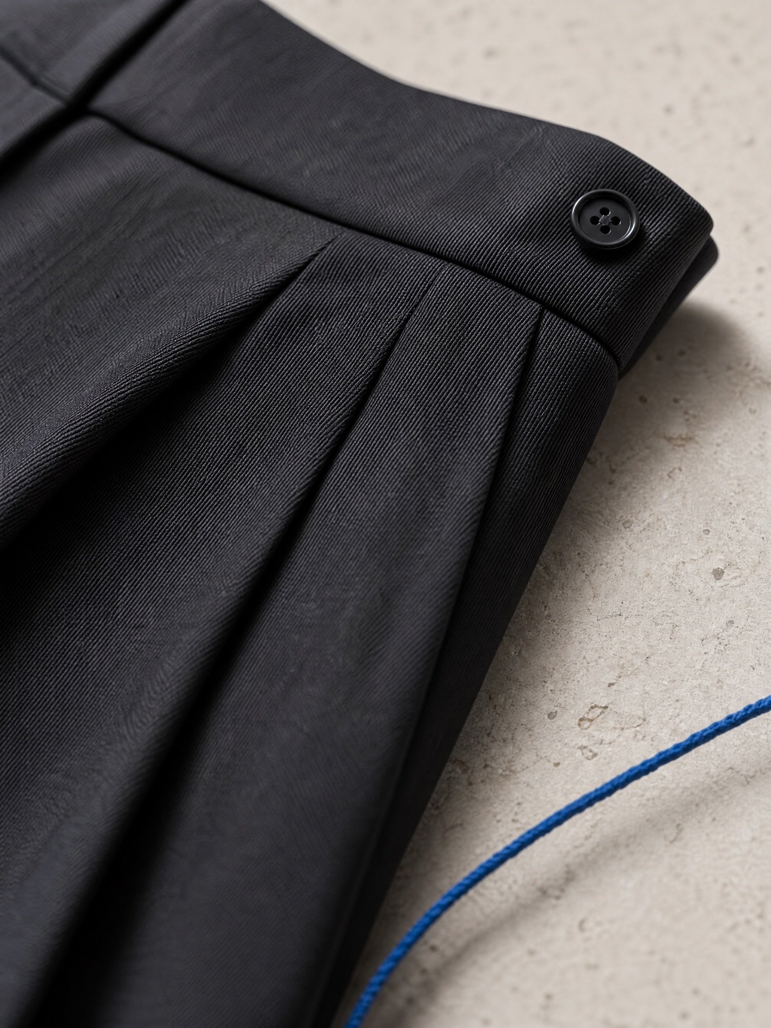 Pleated Wide-Leg Culottes in Black, close-up detail