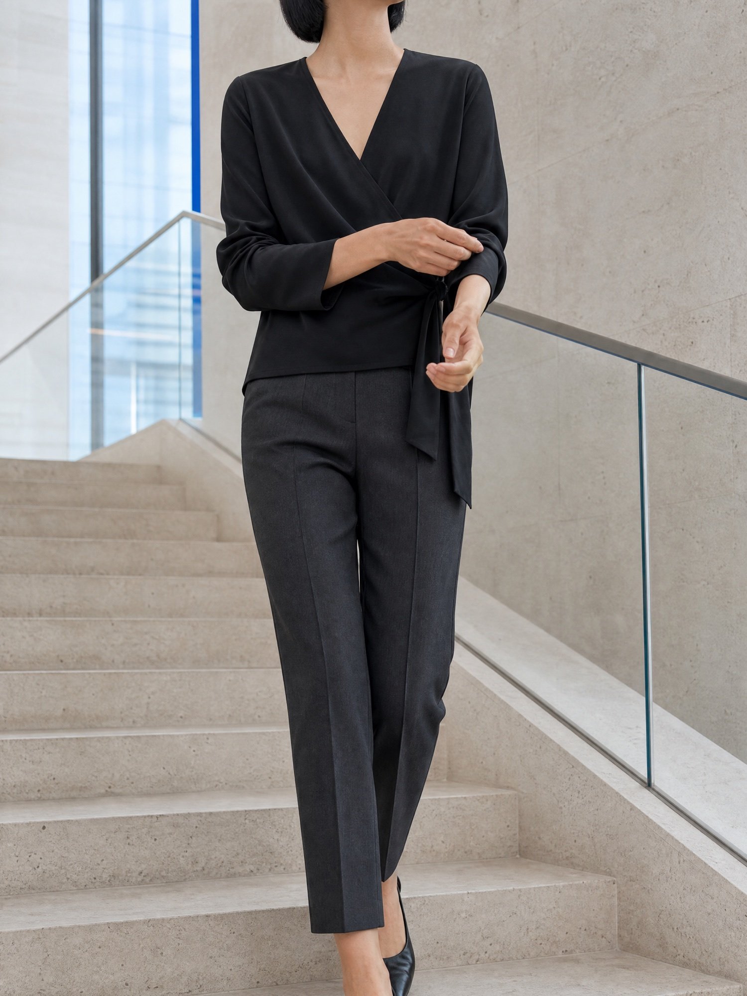 Crepe Wrap Top in Black, worn on model