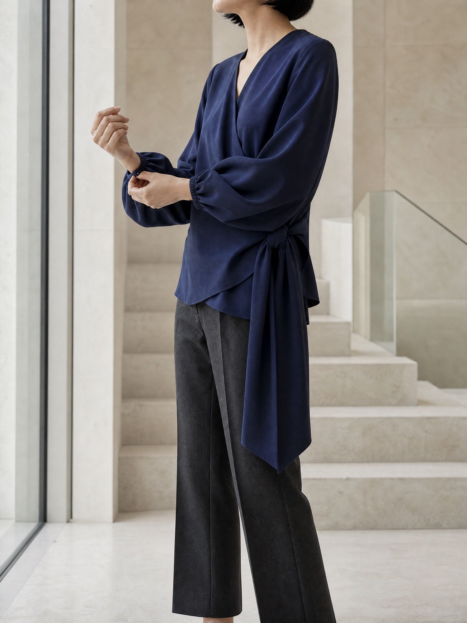 Long-Sleeve Tie Wrap Top in Navy, worn on model